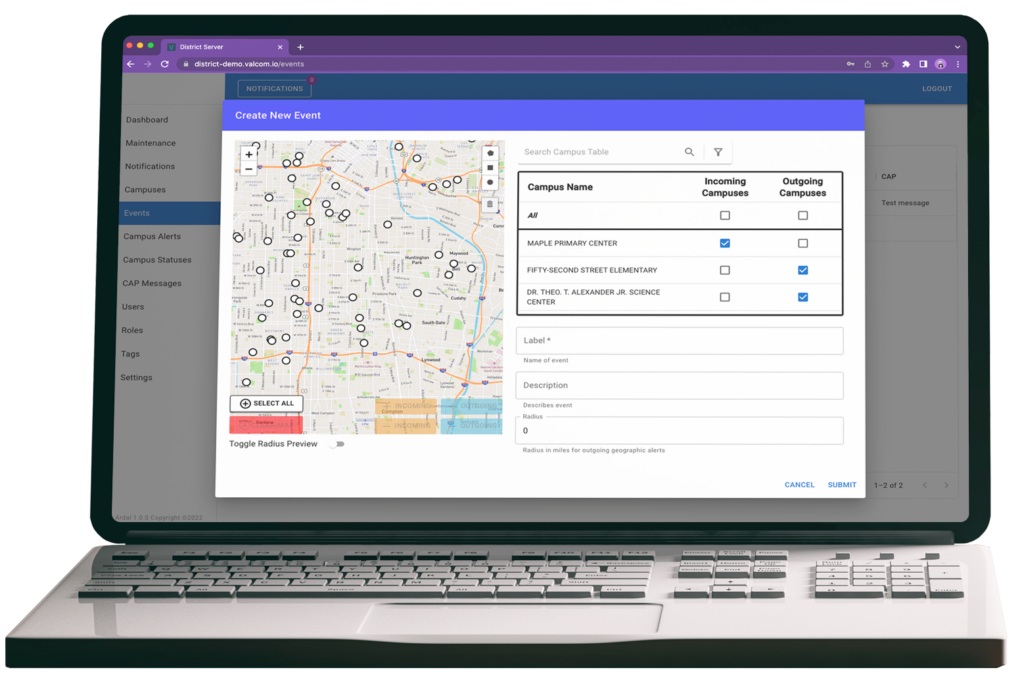 Laptop with Valcom's enterprise communication and management software browser user face on the screen